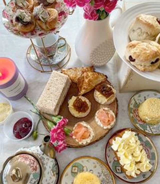 Essence of Cake afternoon tea crockery cutlery hire cake finger sandwiches cupcakes scones cream jam scented candle